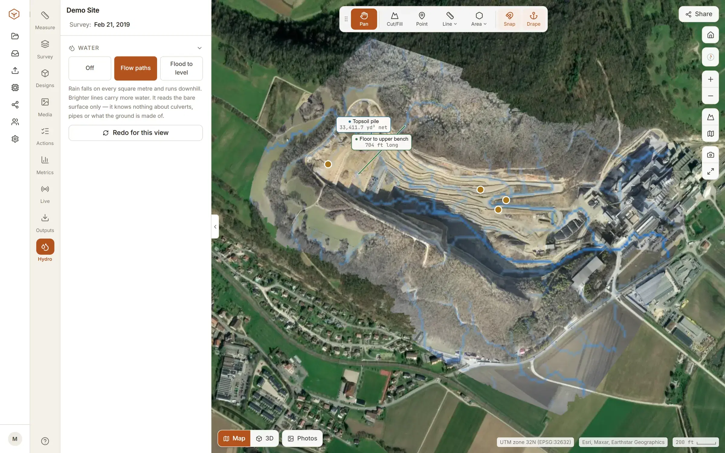 Water flow paths traced in blue over the quarry